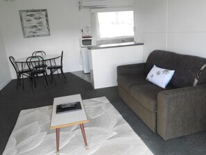 Apartment, 2 Bedrooms | Living area | Flat-screen TV - Raglan Palm Beach Motel (Raglan)