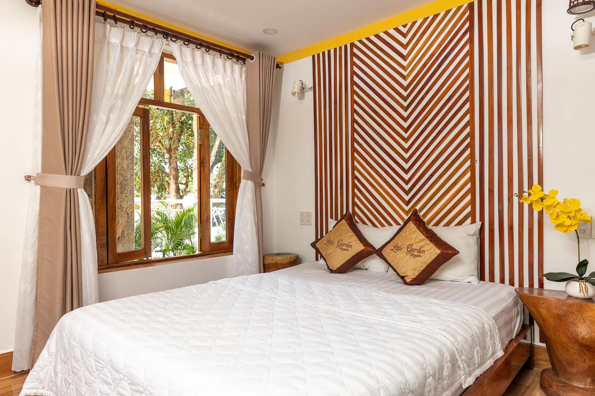 Family Quadruple Room | Blackout curtains, free WiFi, bed sheets