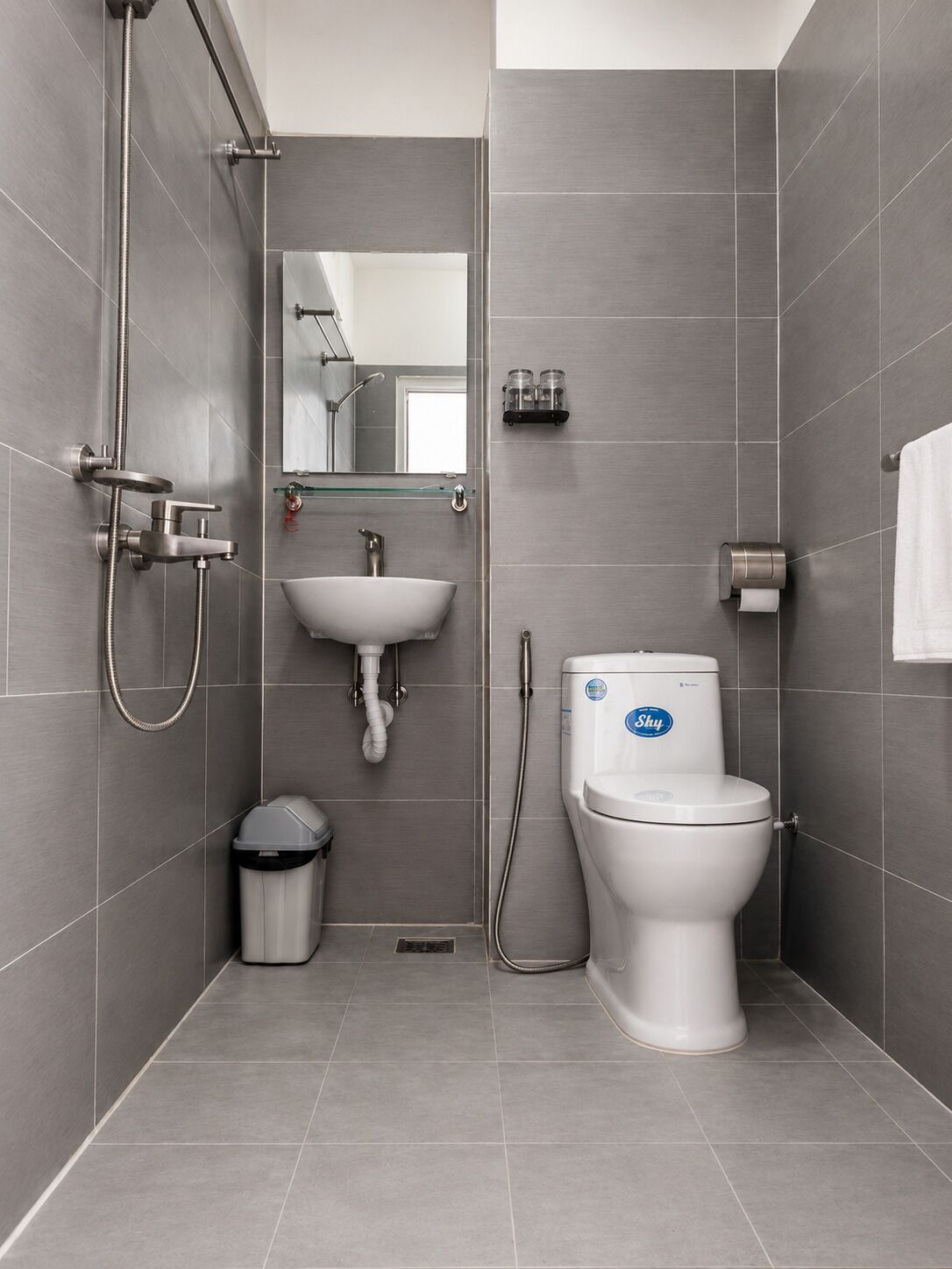 Shower, free toiletries, hair dryer, slippers