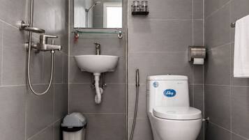 Shower, free toiletries, hair dryer, slippers