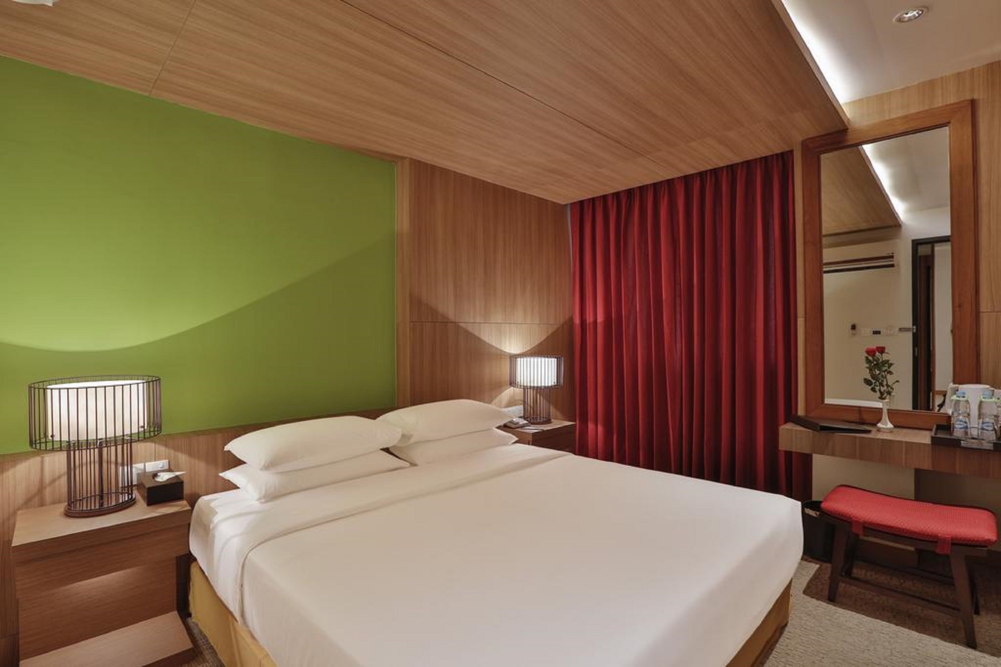 superior double or twin room | minibar, in-room safe, blackout curtains, iron/ironing board