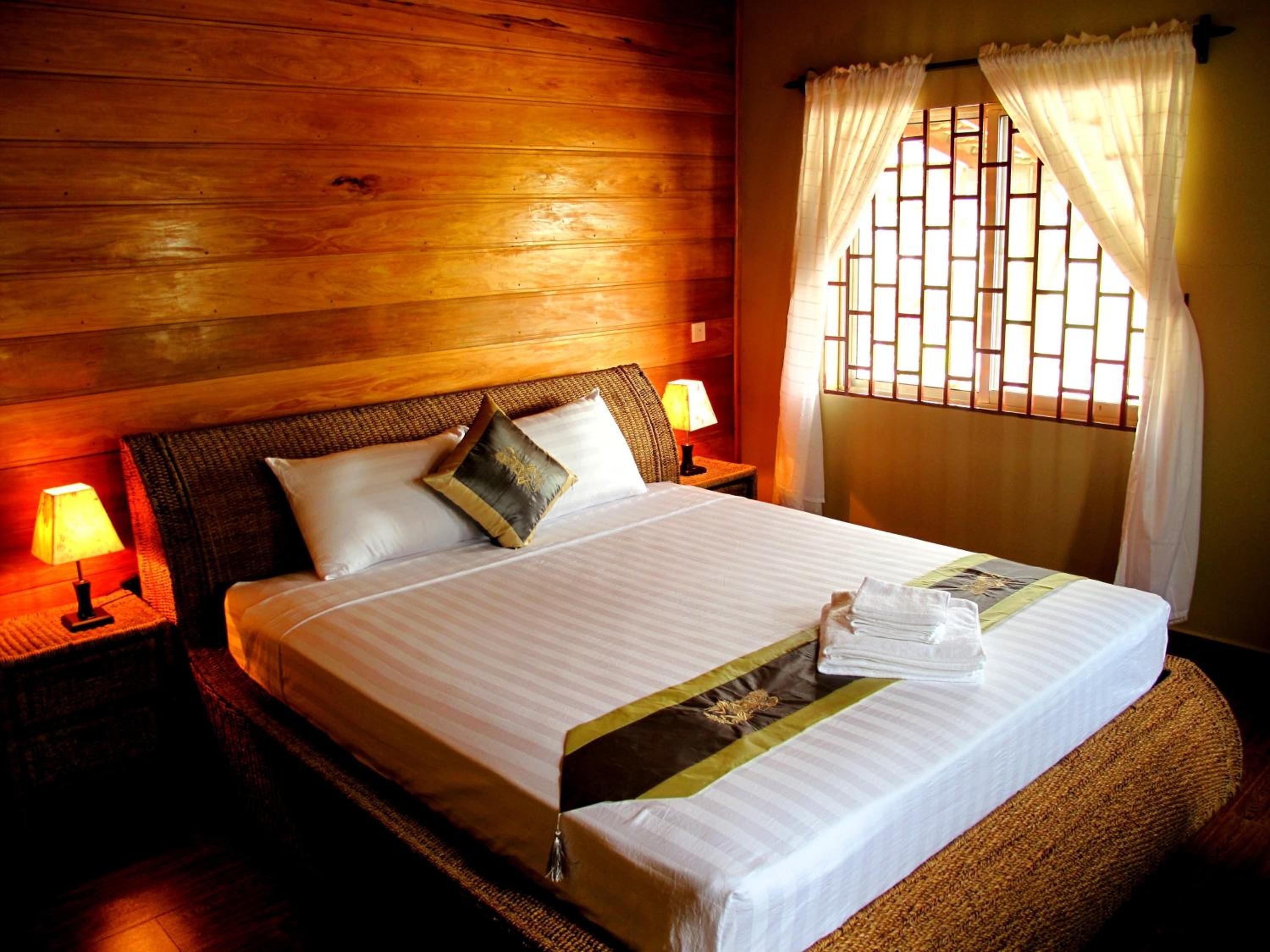 deluxe bungalow, 1 bedroom, garden view | minibar, in-room safe, individually furnished, desk