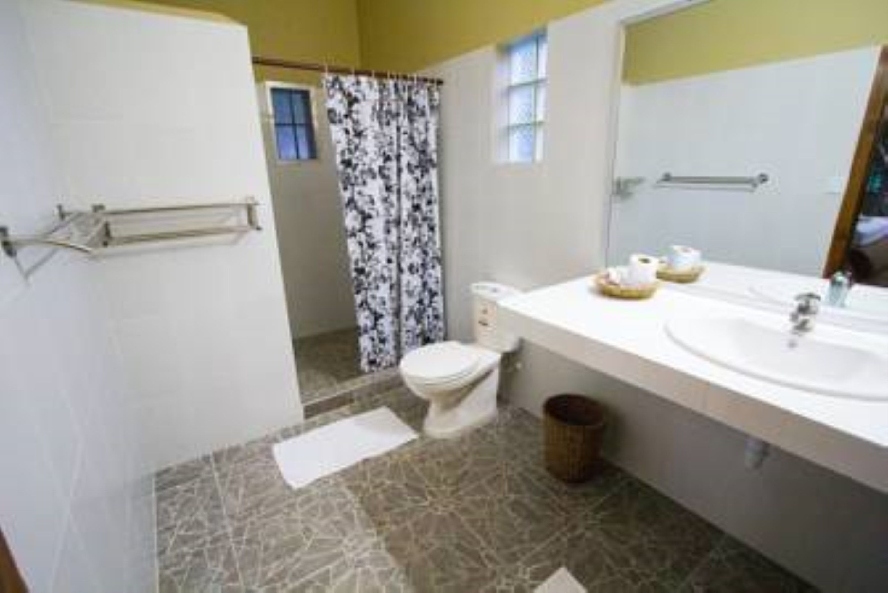 shower, designer toiletries, hair dryer, towels