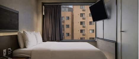 Ropa de cama de alta calidad, escritorio y wifi gratis