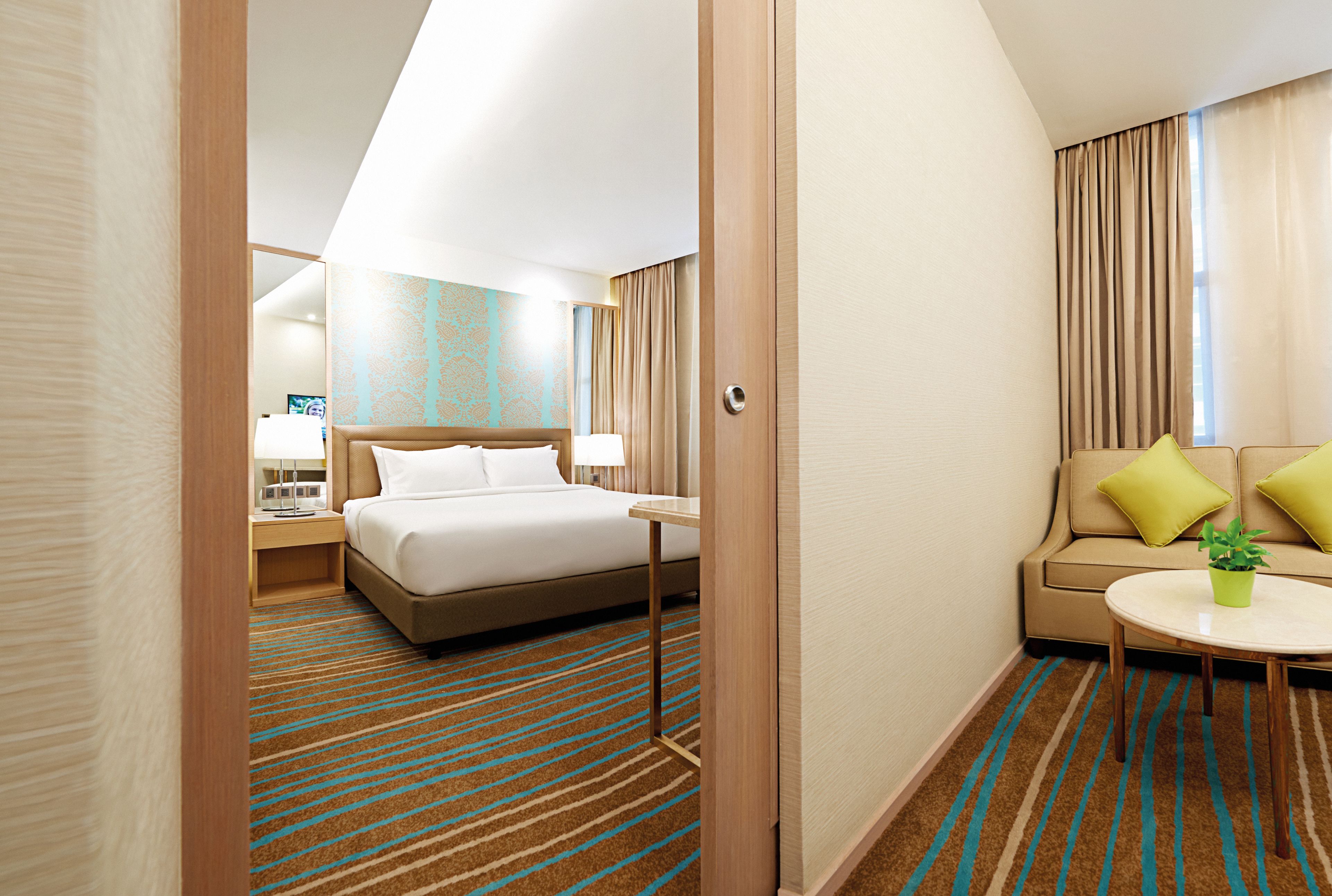 junior suite | in-room safe, desk, soundproofing, iron/ironing board