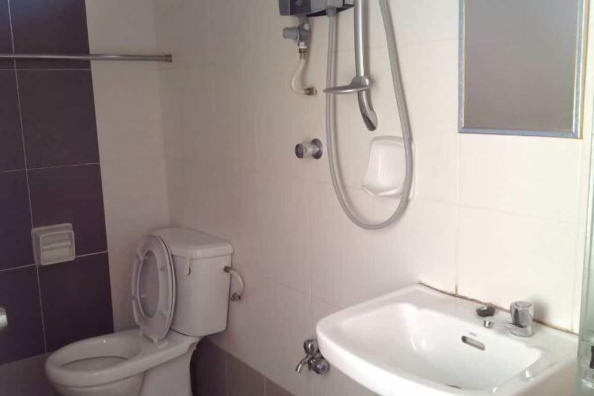 Shower, free toiletries, hair dryer, slippers