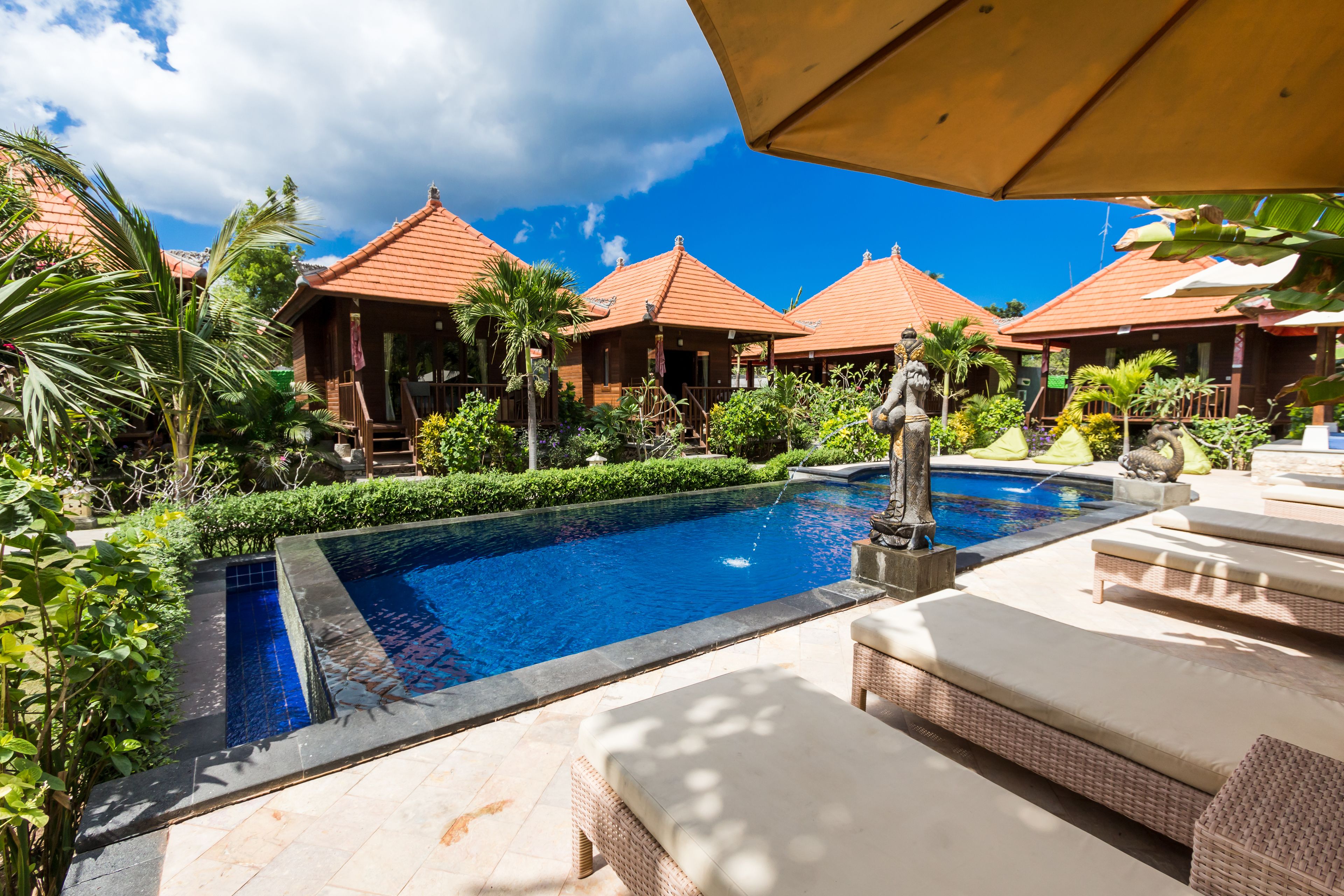 outdoor pool, pool umbrellas, pool loungers