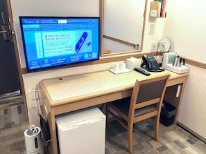 Desk, free WiFi, bed sheets