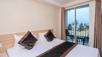 Habitación cuádruple Deluxe | 1 dormitorio, ropa de cama de alta calidad, minibar y caja fuerte