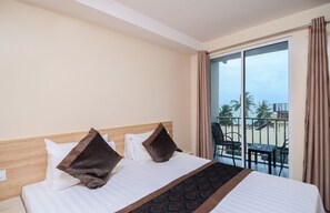 Deluxe vierpersoonskamer | 1 slaapkamer, luxe beddengoed, een minibar, een kluis op de kamer