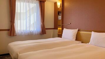 Meja kerja, ruang kerja ramah laptop, Wi-Fi gratis, dan seprai linen