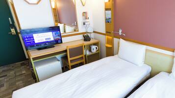 Desk, laptop workspace, free WiFi, bed sheets