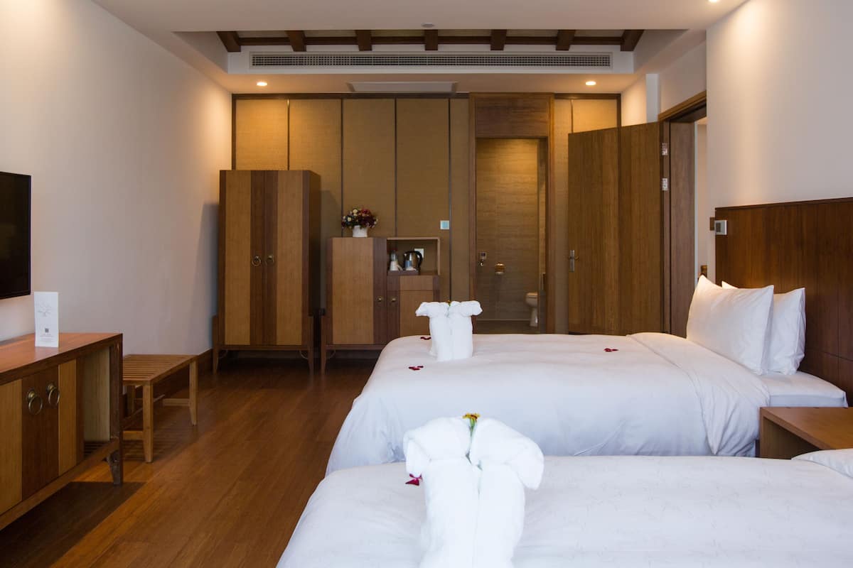Courtyard Deluxe Family Suite  | In-room safe, desk, blackout drapes, WiFi (free)