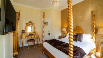 Suite Deluxe, 1 letto matrimoniale | Una scrivania, ferro/asse da stiro, Wi-Fi gratuito, lenzuola