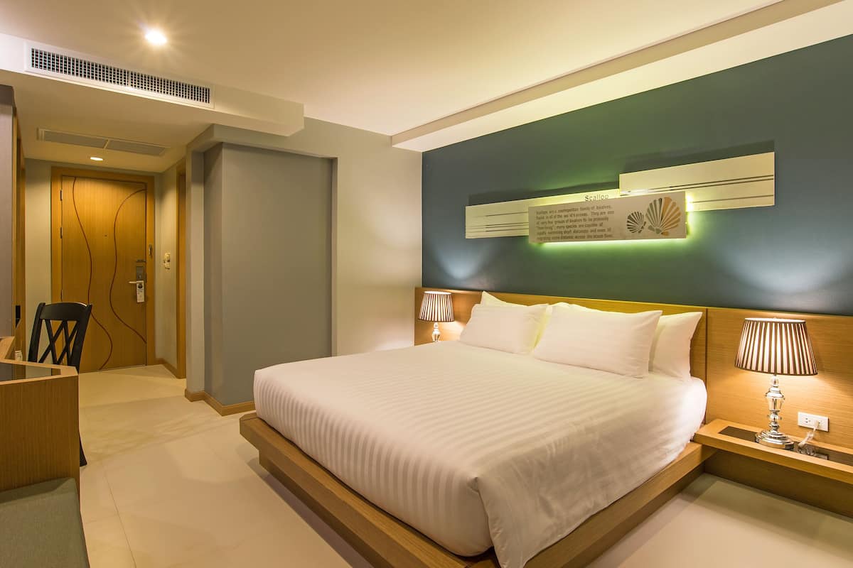 Habitación superior | 3 habitaciones, caja de seguridad en la habitación y escritorio
