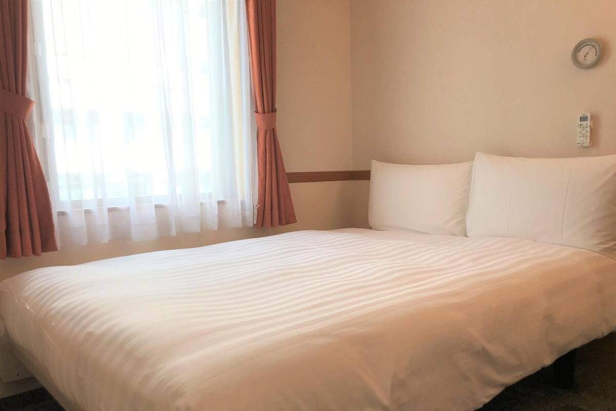 Desk, blackout curtains, iron/ironing board (on request), free WiFi