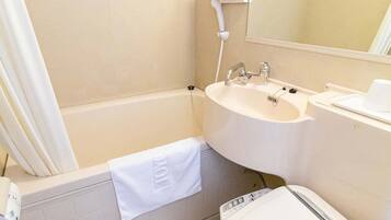 Combined shower/tub, deep soaking tub, free toiletries, hair dryer