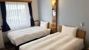 Desk, laptop workspace, free WiFi, bed sheets