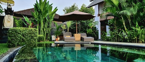 Outdoor pool, open 7:30 AM to 7:00 PM, pool umbrellas, pool loungers