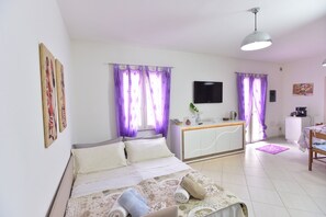 Apartment, 1 Bedroom | Living room | 43-inch flat-screen TV with digital channels, TV - IzzHome Regina Margherita (Pula)