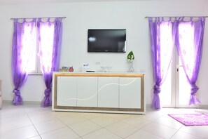 Apartment, 1 Bedroom | Living area | 43-inch flat-screen TV with digital channels, TV - IzzHome Regina Margherita (Pula)