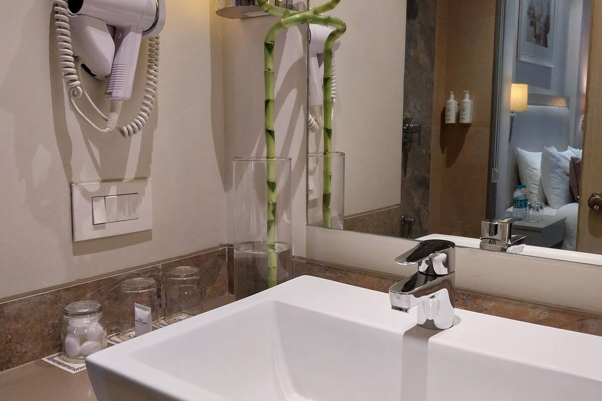 shower, free toiletries, slippers, towels