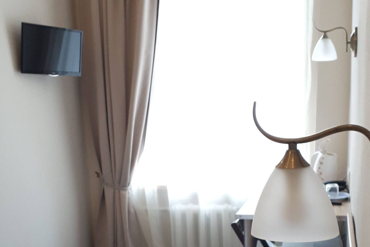 Coffres-forts dans les chambres, fer et planche à repasser