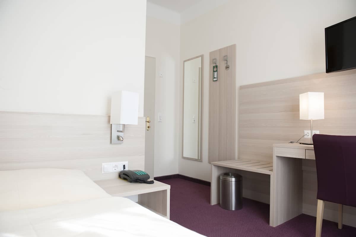 single room | in-room safe, desk, blackout curtains, free wifi