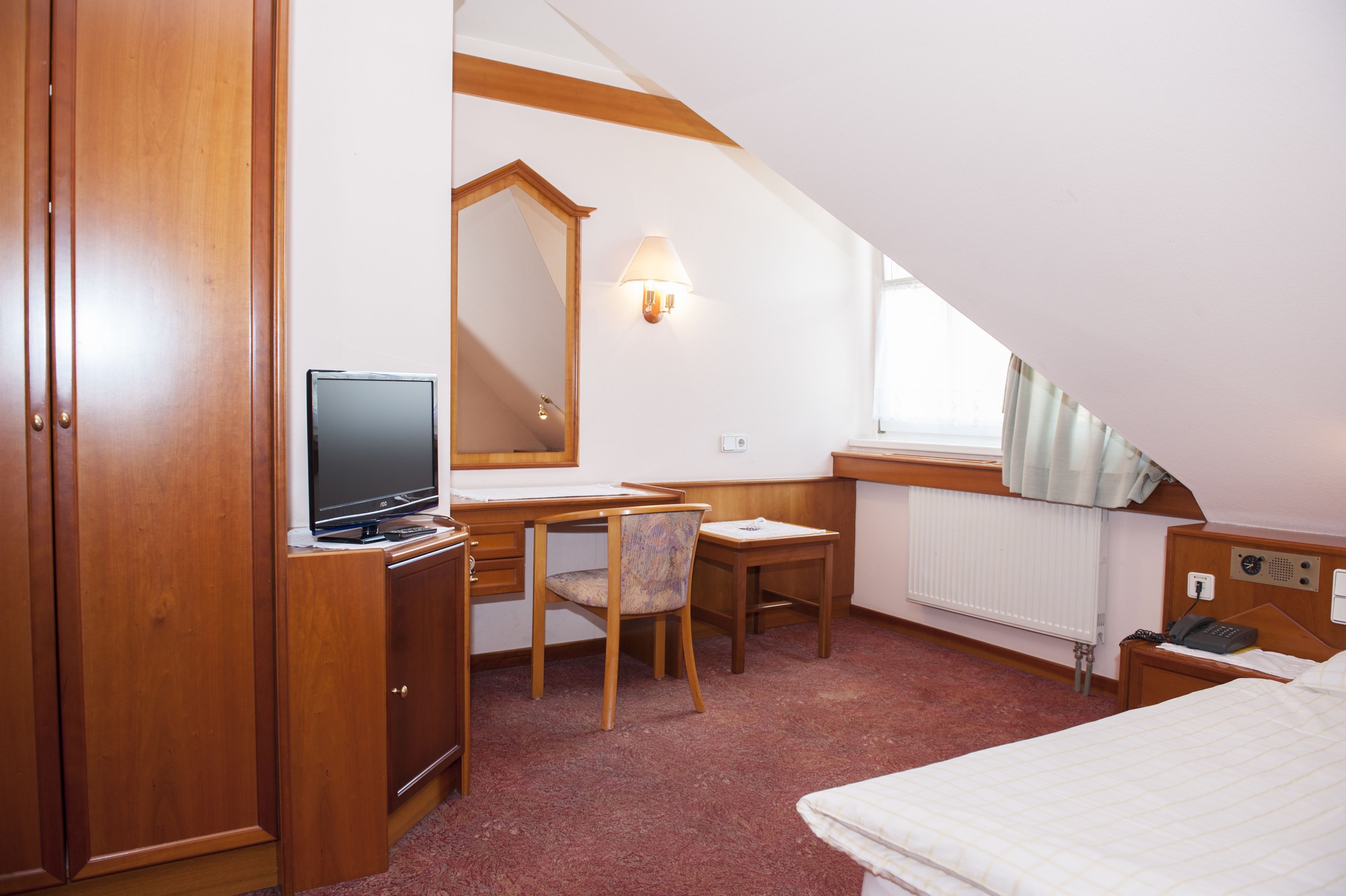 single room | in-room safe, desk, blackout curtains, free wifi