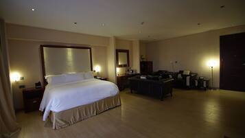 Deluxe Suite | Premium bedding, in-room safe, desk, laptop workspace