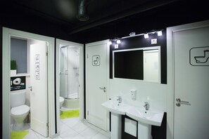 Shower, hair dryer, slippers, towels