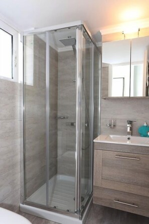 Shower, free toiletries, hair dryer, bathrobes