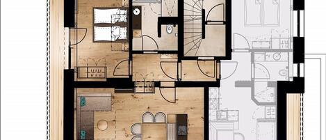 A floor plan of a hotel with multiple rooms, a central living area, and a kitchen.