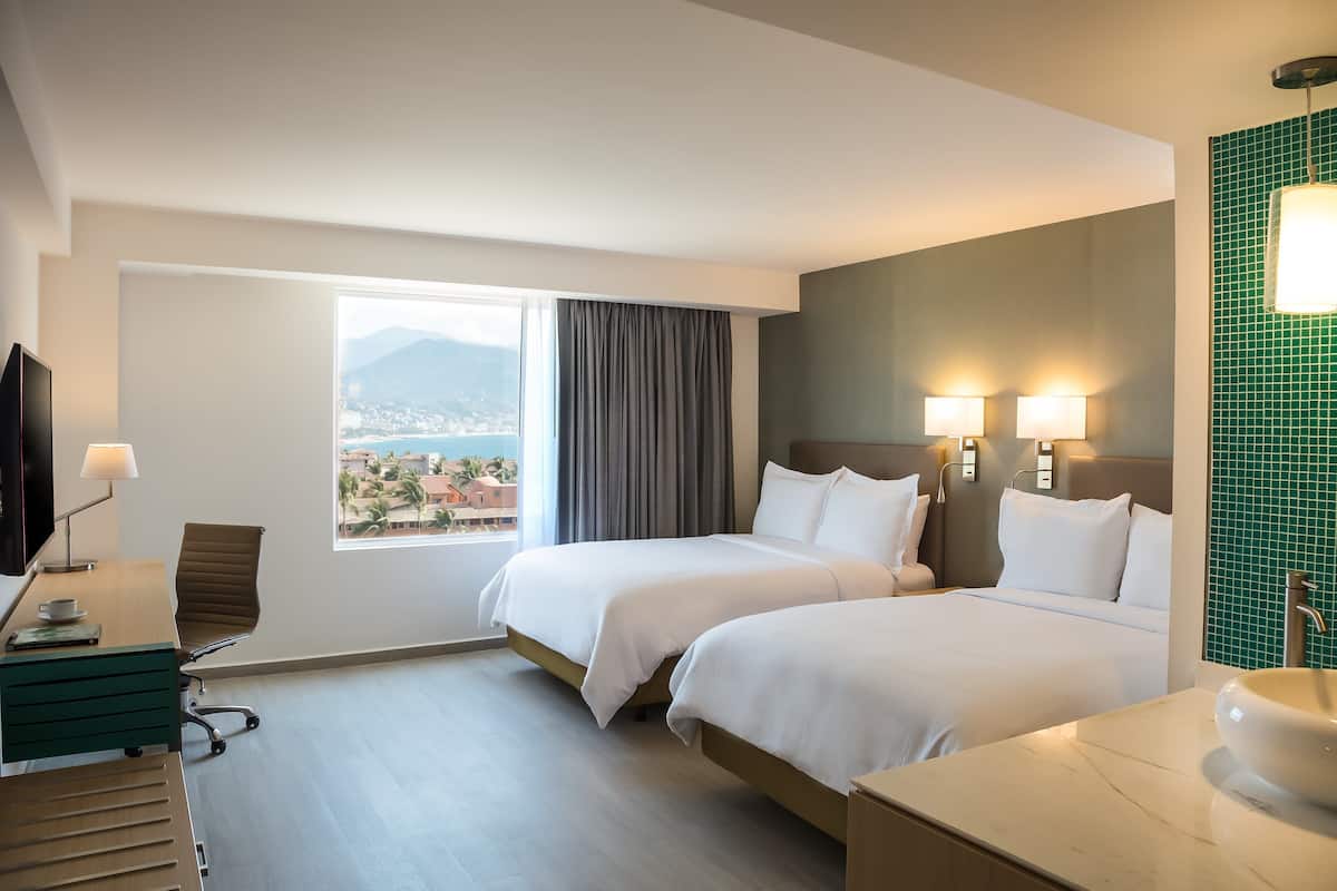 Premium bedding, pillow-top beds, in-room safe, desk