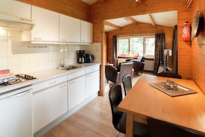 Fridge, stovetop, coffee/tea maker