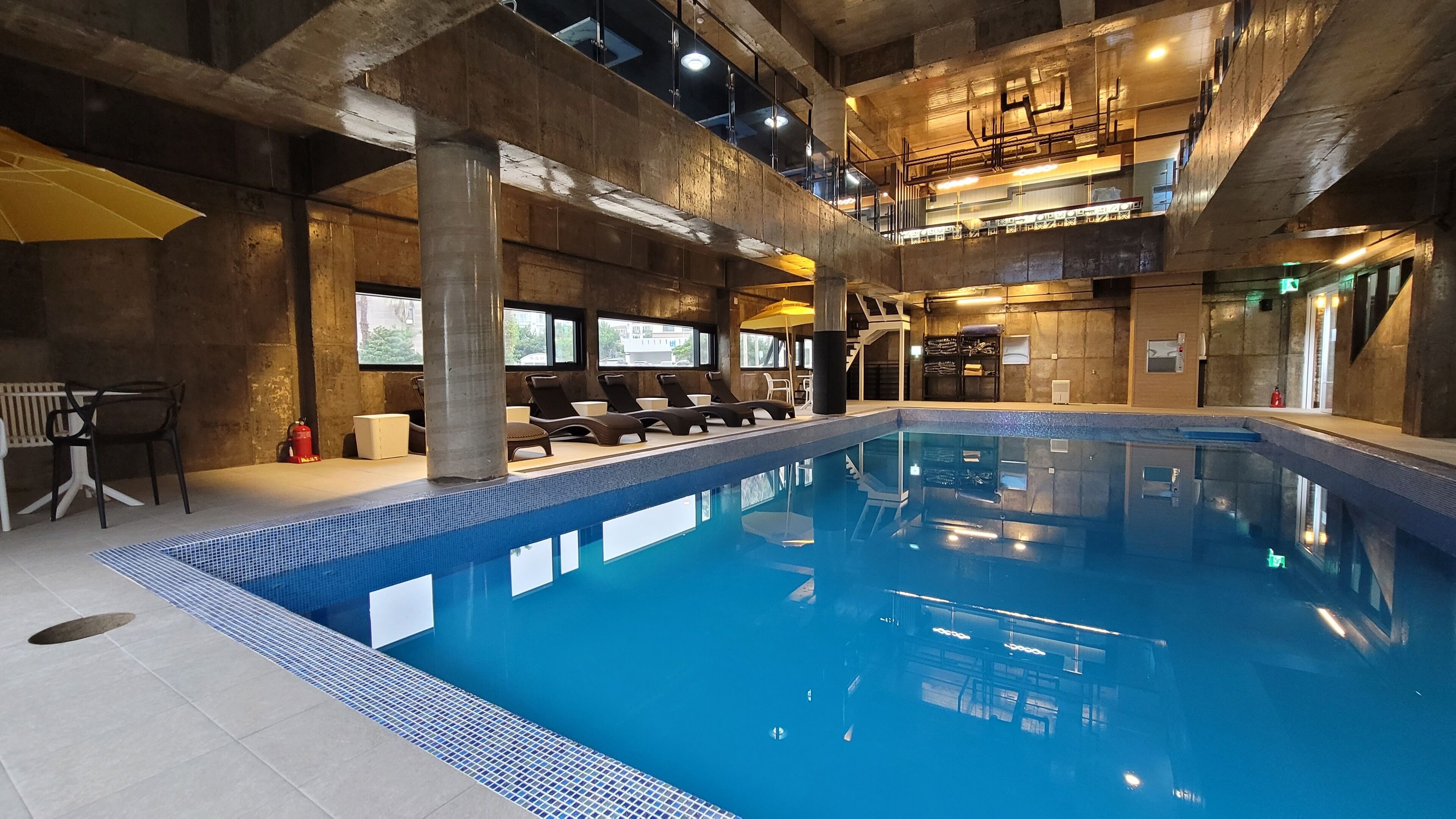 indoor pool, open 3:00 pm to 10:30 pm, pool umbrellas