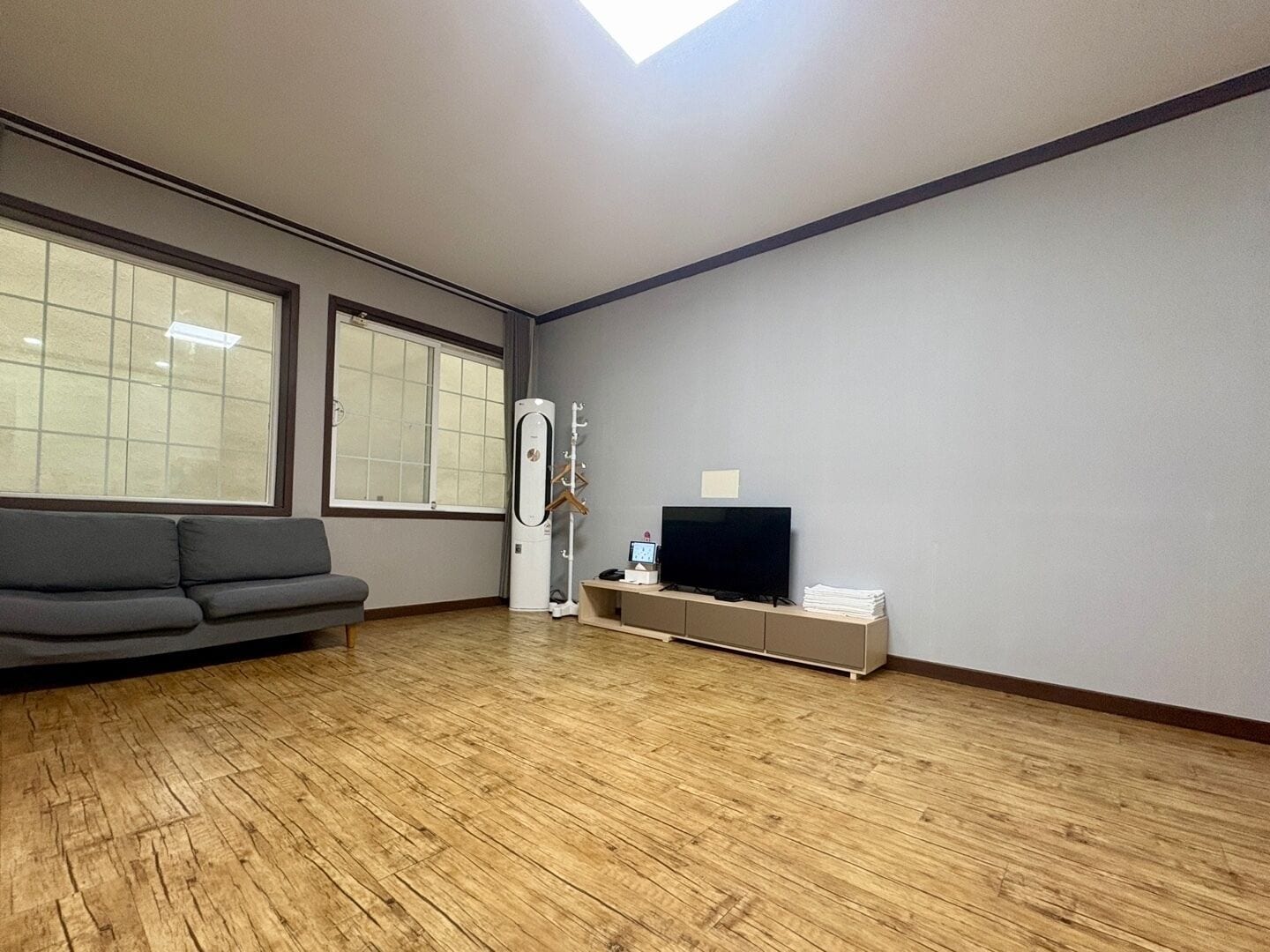 family room (adjacent to building, no view) | living area | tv, heated floors