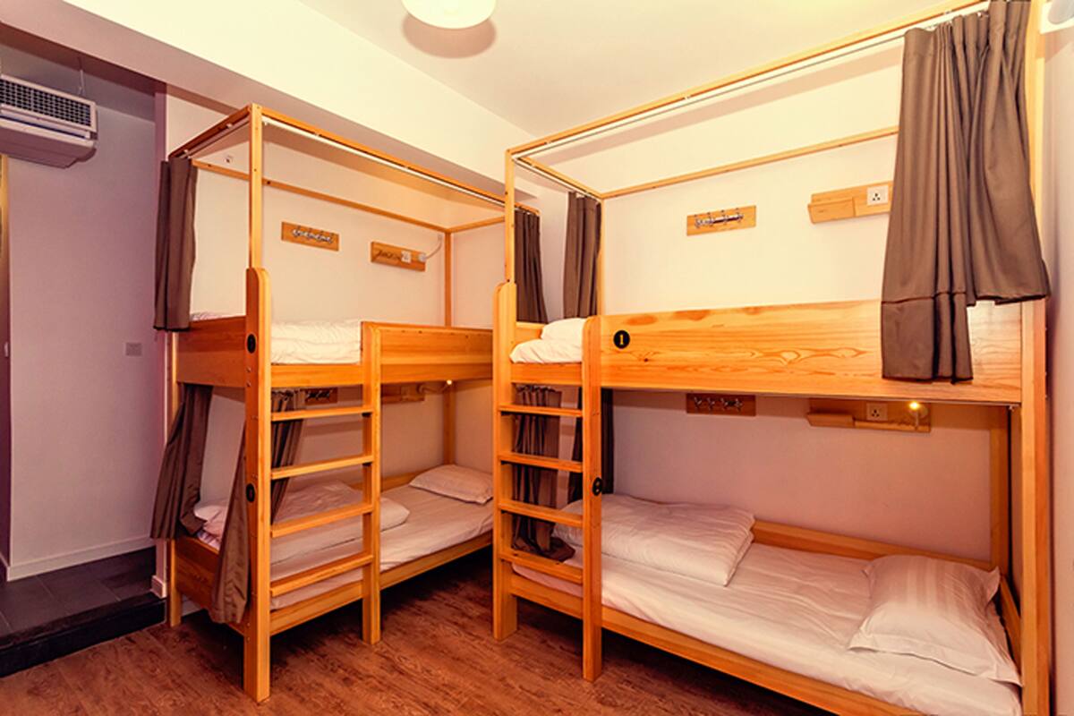 One Bed in 4-bed Mixed Dorm with Public Bathroom | Premium bedding, in-room safe, free WiFi