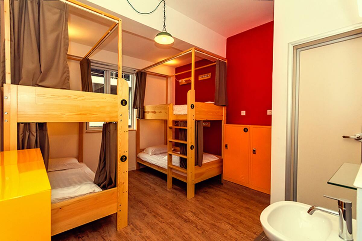One Bed in 4-bed Female Dorm | Premium bedding, in-room safe, free WiFi
