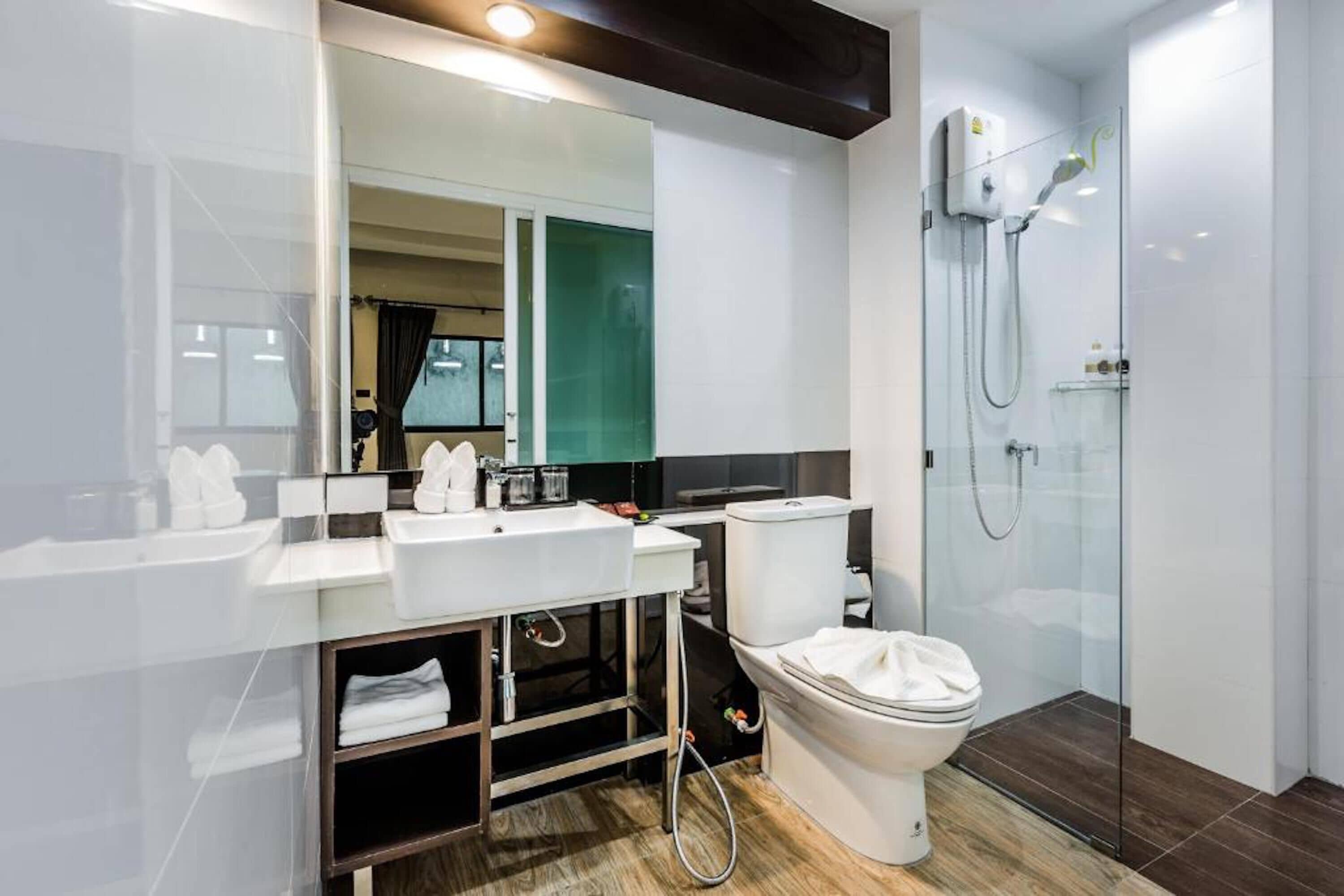superior twin room | bathroom | shower, free toiletries, hair dryer, slippers