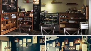 A cozy cafe with wooden furniture, a chalkboard menu, and a variety of items on shelves. - Cottonwood Bed & Breakfast House (Bandung)