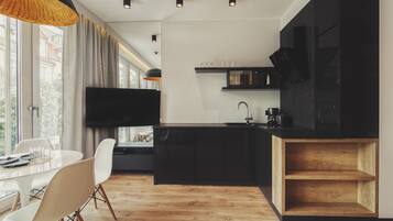 Executive Apartment | Private kitchen | Fridge, espresso maker, coffee/tea maker, electric kettle