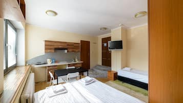 Studio, Kitchenette | Living area | TV