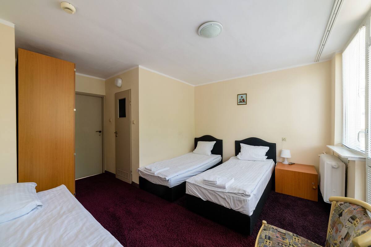 Triple Room | Living area | TV