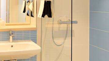 Comfort Double or Twin Room | Bathroom | Shower, free toiletries, hair dryer, towels