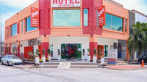 A hotel with a prominent sign reading "HOTEL THE NIGHT OF". - Night Queen Hotel (Sepang)