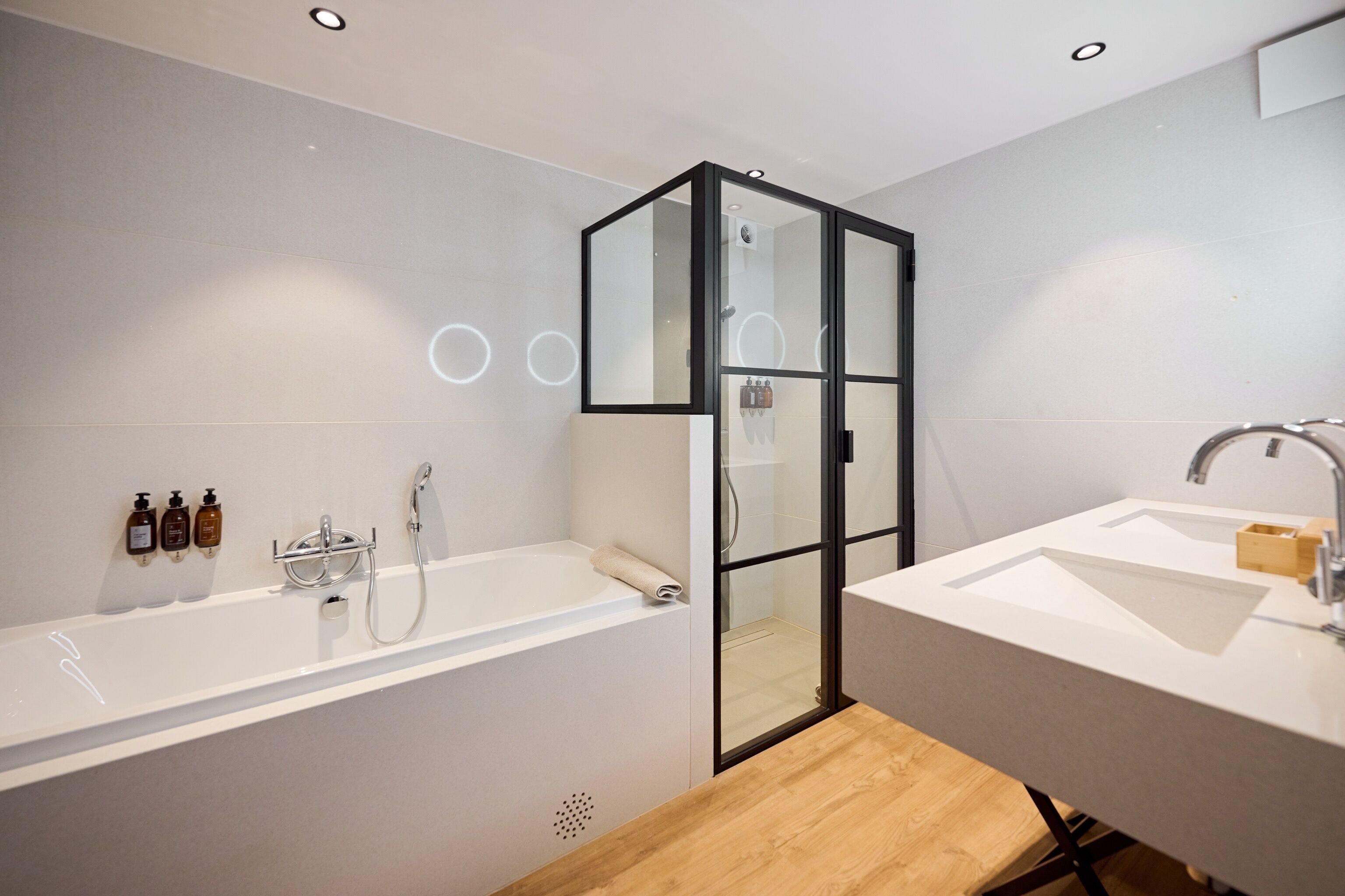 suite, garden view | bathroom | free toiletries, bathrobes, slippers, towels