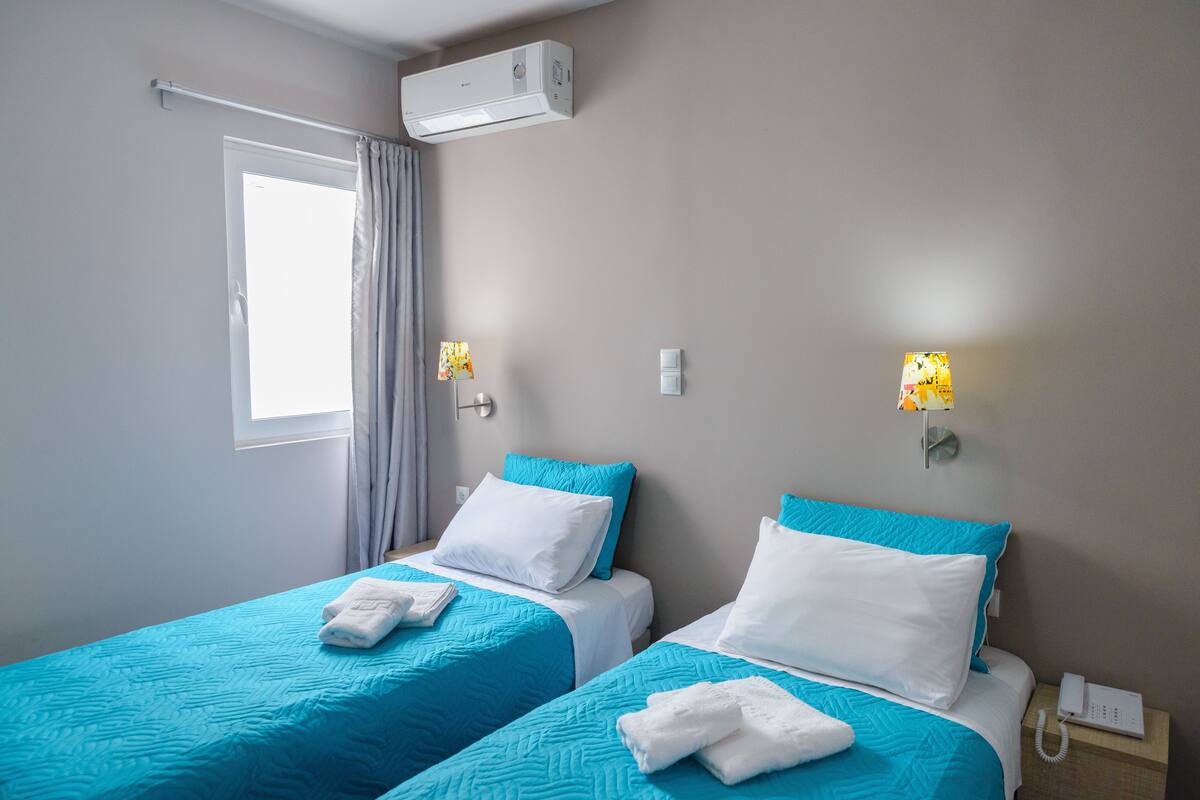 Twin Room, 2 Single Beds | Iron/ironing board (on request), free WiFi, bed sheets