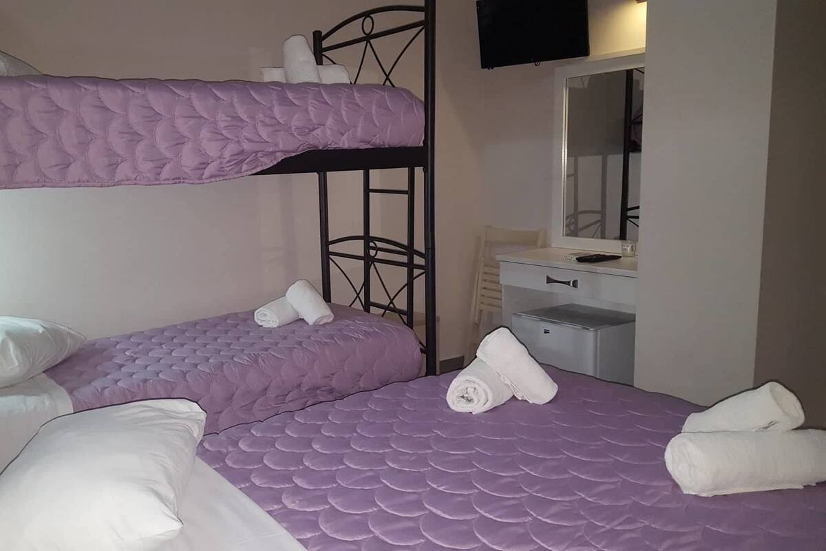 Basic Quadruple Room | Iron/ironing board (on request), free WiFi, bed sheets