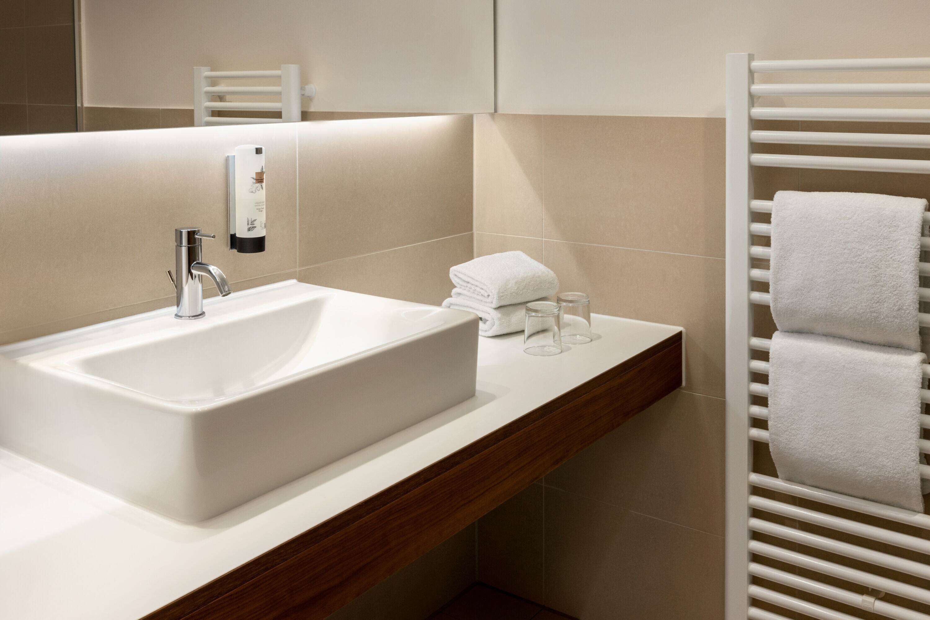 comfort room (plus) | bathroom | free toiletries, hair dryer, slippers, towels